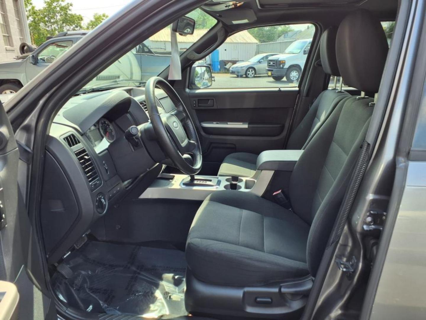 2009 Sterling Gray Clearcoat Metallic Ford Escape XLT (1FMCU03749K) with an 2.5L Duratec 2.5L I4 171hp 171ft. lbs. Sequential-Port F.I. engine, 6-Speed Automatic transmission, located at 50 Eastern Blvd., Essex, MD, 21221, (410) 686-3444, 39.304367, -76.484947 - Photo#12