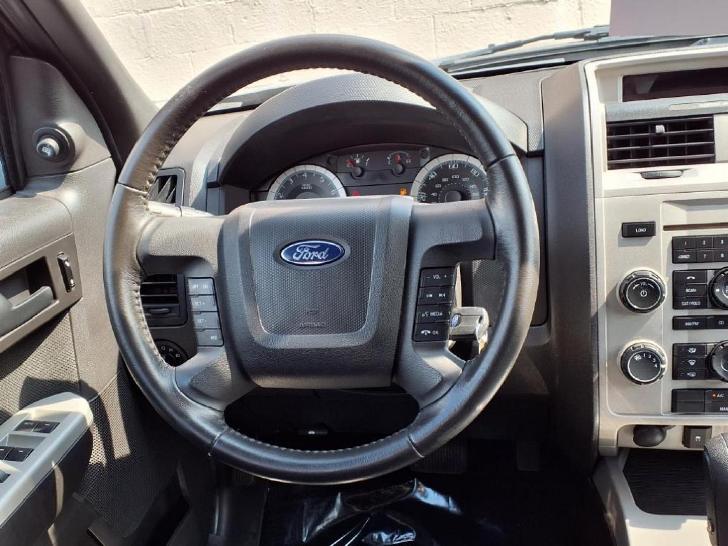 2009 Sterling Gray Clearcoat Metallic Ford Escape XLT (1FMCU03749K) with an 2.5L Duratec 2.5L I4 171hp 171ft. lbs. Sequential-Port F.I. engine, 6-Speed Automatic transmission, located at 50 Eastern Blvd., Essex, MD, 21221, (410) 686-3444, 39.304367, -76.484947 - Photo#14