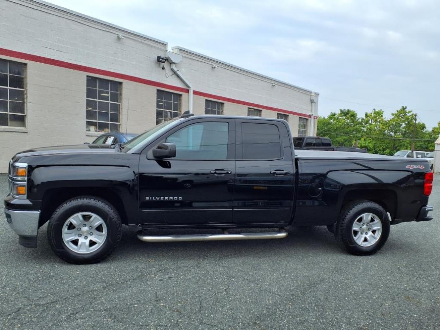 2015 Black Chevrolet Silverado 1500 LT (1GCVKREH6FZ) with an 4.3L EcoTec3 4.3L Flex Fuel V6 285hp 305ft. lbs. Fuel Injected engine, 6-Speed Shiftable Automatic w/Overdrive transmission, located at 50 Eastern Blvd., Essex, MD, 21221, (410) 686-3444, 39.304367, -76.484947 - Photo#1