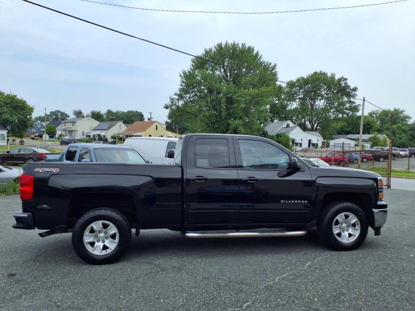 2015 Black Chevrolet Silverado 1500 LT (1GCVKREH6FZ) with an 4.3L EcoTec3 4.3L Flex Fuel V6 285hp 305ft. lbs. Fuel Injected engine, 6-Speed Shiftable Automatic w/Overdrive transmission, located at 50 Eastern Blvd., Essex, MD, 21221, (410) 686-3444, 39.304367, -76.484947 - Photo#6