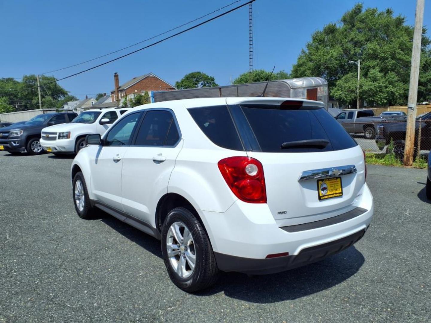 2011 Summit White Chevrolet Equinox LS (2CNFLCEC4B6) with an 2.4L 4 Cylinder Fuel Injected engine, ATAWD transmission, located at 50 Eastern Blvd., Essex, MD, 21221, (410) 686-3444, 39.304367, -76.484947 - Photo#2