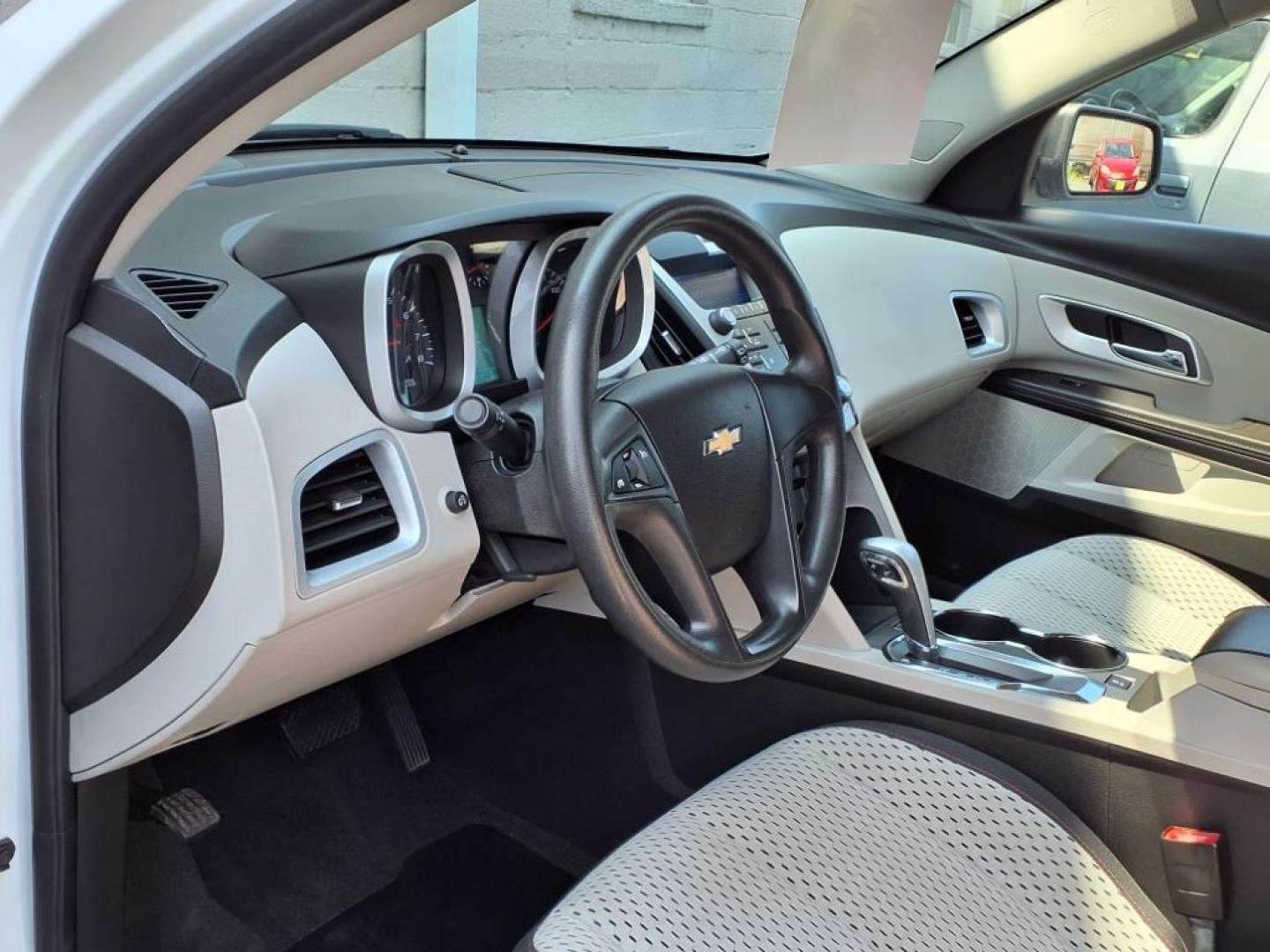 2011 Summit White Chevrolet Equinox LS (2CNFLCEC4B6) with an 2.4L 4 Cylinder Fuel Injected engine, ATAWD transmission, located at 50 Eastern Blvd., Essex, MD, 21221, (410) 686-3444, 39.304367, -76.484947 - Photo#10