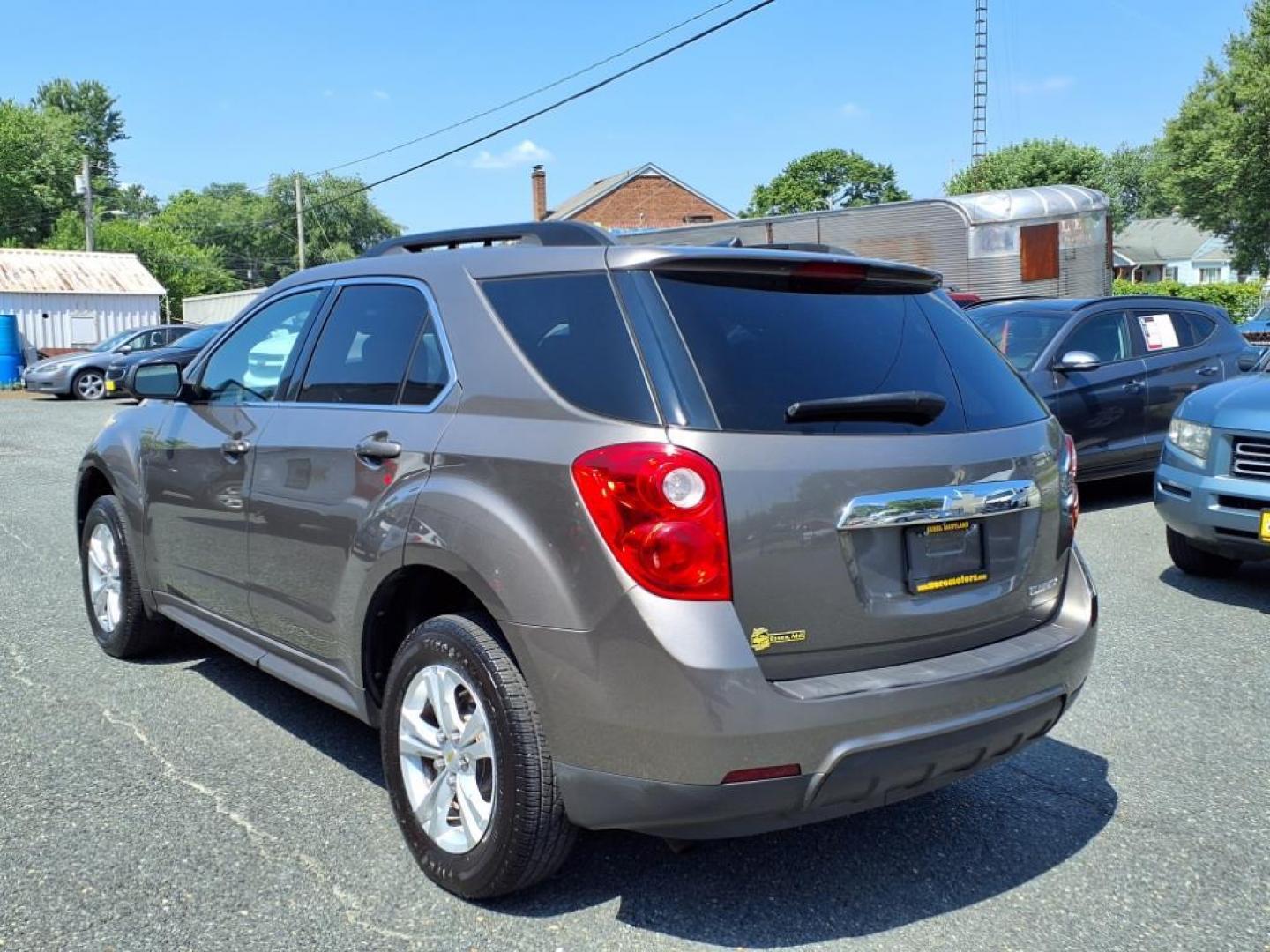 2011 Mocha Steel Metallic Chevrolet Equinox LT (2CNALDECXB6) with an 2.4L 4 Cylinder Fuel Injected engine, Automatic transmission, located at 50 Eastern Blvd., Essex, MD, 21221, (410) 686-3444, 39.304367, -76.484947 - Photo#2