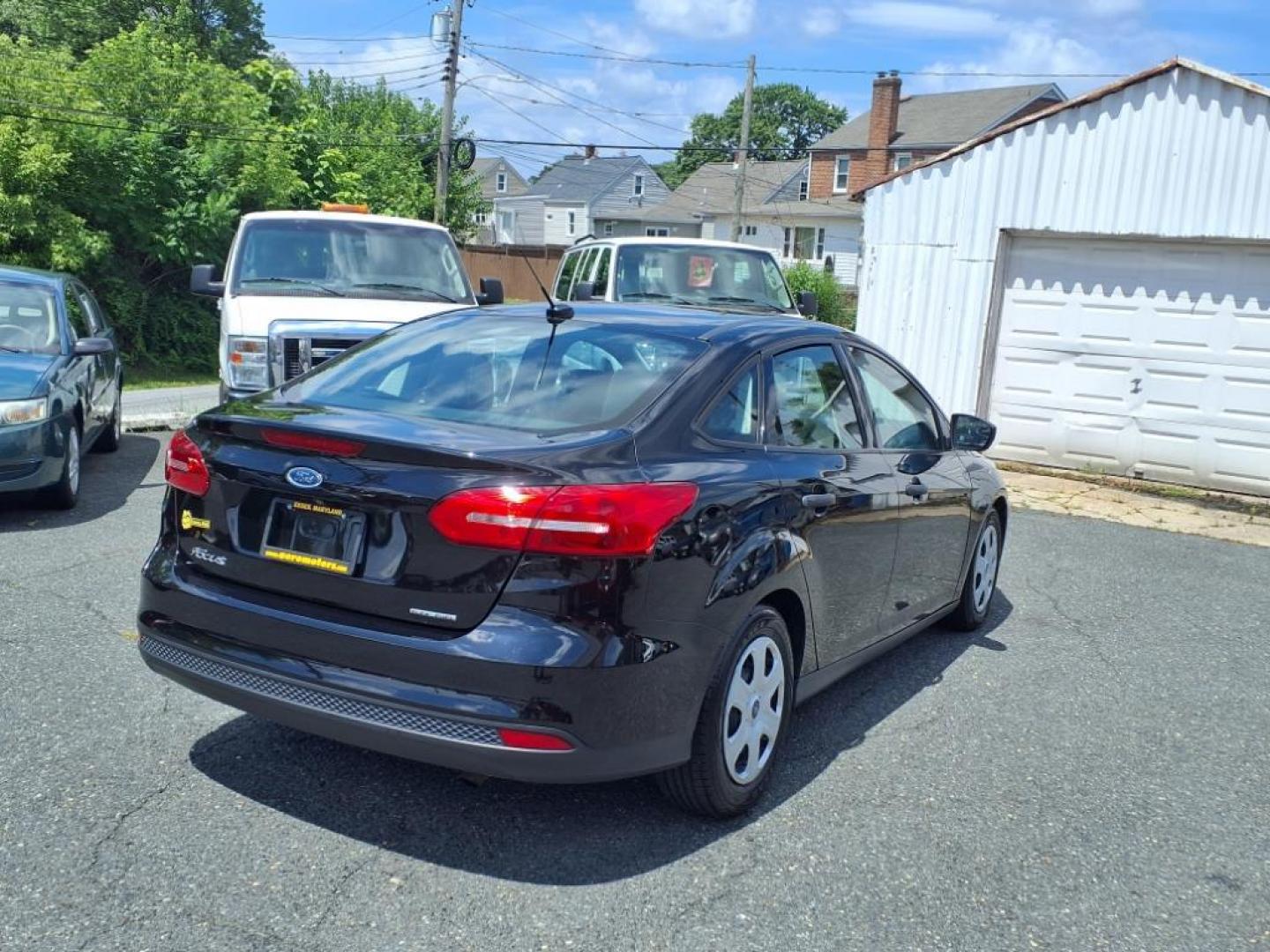 2016 Shadow Black Ford Focus S (1FADP3E28GL) with an 2.0L 2.0L Flex Fuel I4 160hp 146ft. lbs. Fuel Injected engine, Automatic transmission, located at 50 Eastern Blvd., Essex, MD, 21221, (410) 686-3444, 39.304367, -76.484947 - Photo#4