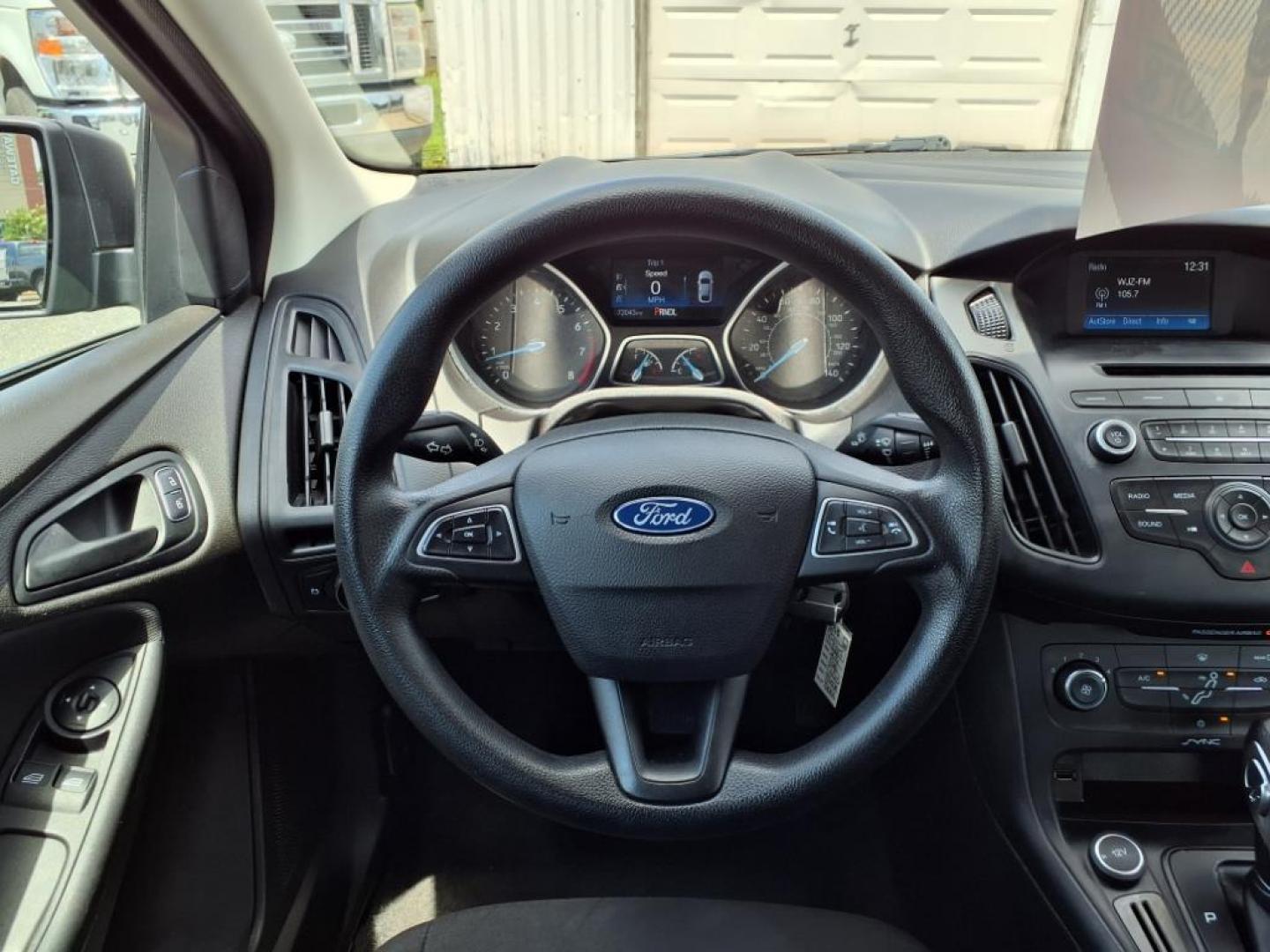2016 Shadow Black Ford Focus S (1FADP3E28GL) with an 2.0L 2.0L Flex Fuel I4 160hp 146ft. lbs. Fuel Injected engine, Automatic transmission, located at 50 Eastern Blvd., Essex, MD, 21221, (410) 686-3444, 39.304367, -76.484947 - Photo#13