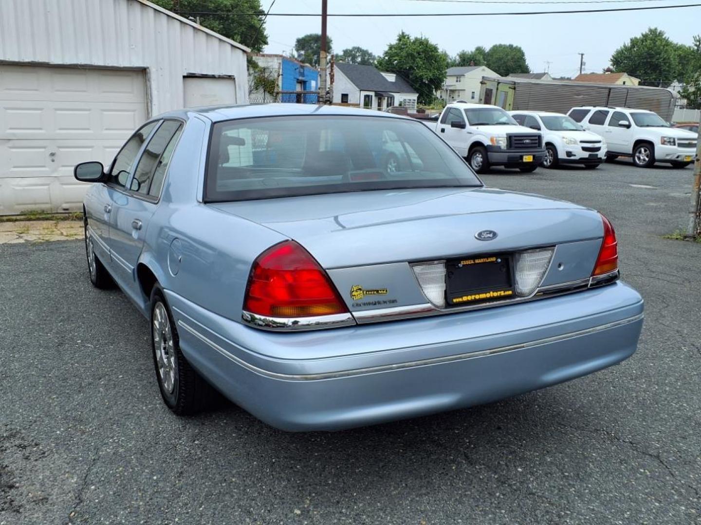 2003 Light Ice Blue Clearcoat Metallic Ford Crown Victoria Base (2FAFP73W03X) with an 4.6L 8 Cylinder Fuel Injected engine, V8 transmission, located at 50 Eastern Blvd., Essex, MD, 21221, (410) 686-3444, 39.304367, -76.484947 - Photo#1