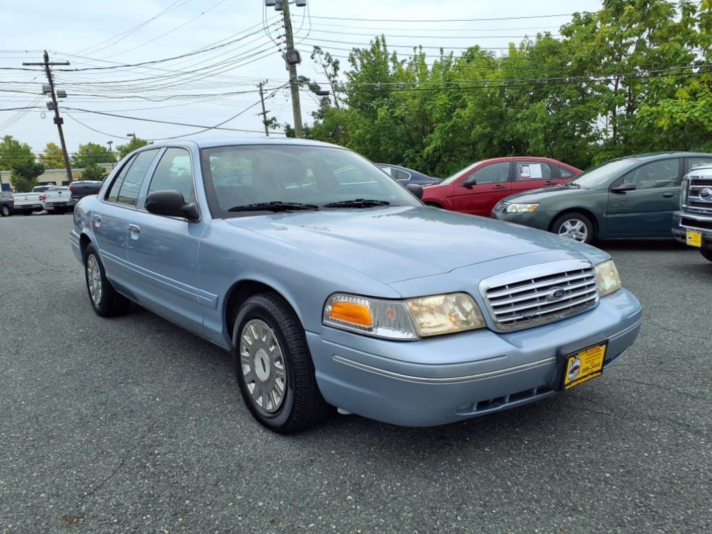 2003 Light Ice Blue Clearcoat Metallic Ford Crown Victoria Base (2FAFP73W03X) with an 4.6L 8 Cylinder Fuel Injected engine, V8 transmission, located at 50 Eastern Blvd., Essex, MD, 21221, (410) 686-3444, 39.304367, -76.484947 - Photo#5