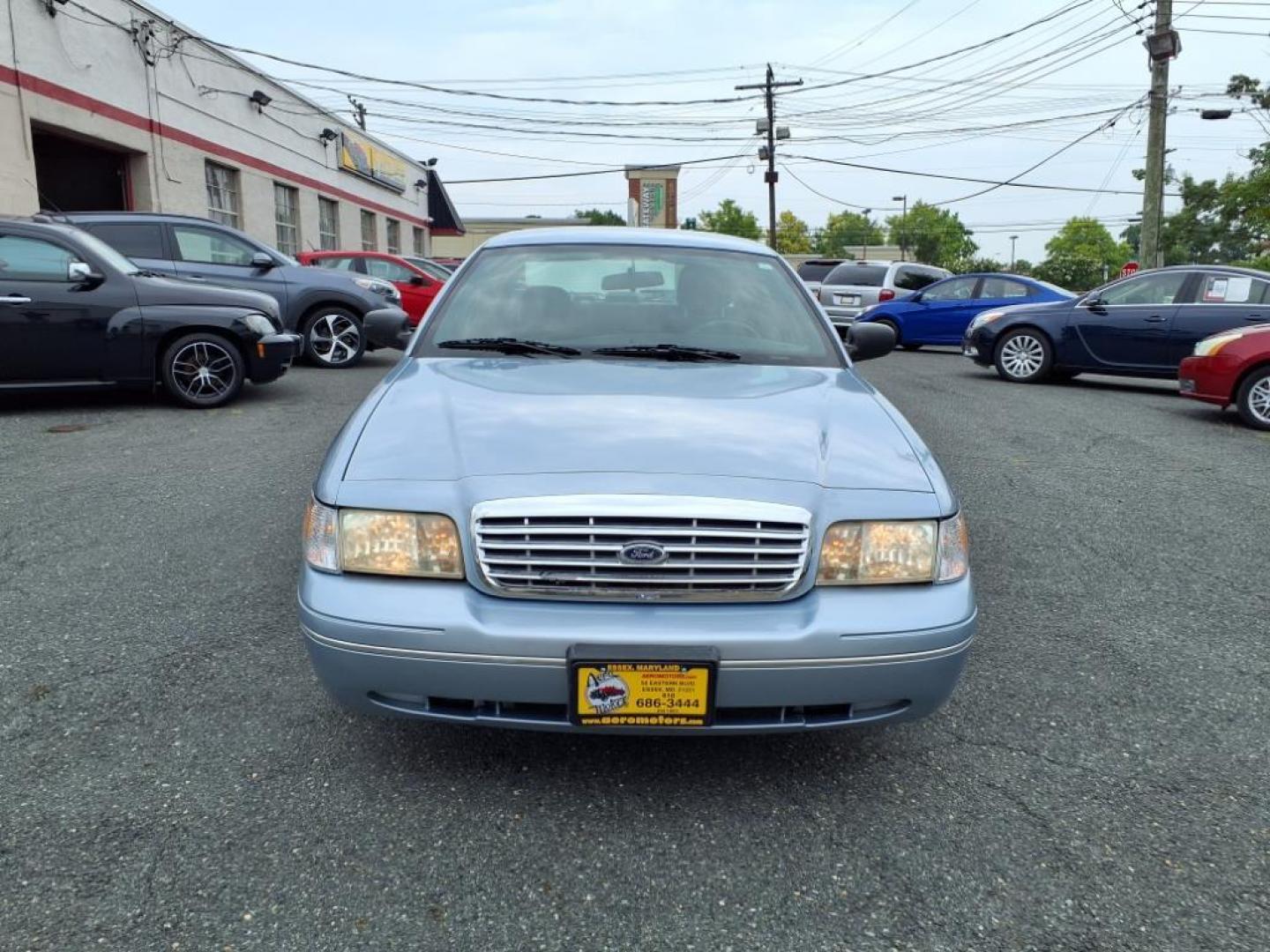 2003 Light Ice Blue Clearcoat Metallic Ford Crown Victoria Base (2FAFP73W03X) with an 4.6L 8 Cylinder Fuel Injected engine, V8 transmission, located at 50 Eastern Blvd., Essex, MD, 21221, (410) 686-3444, 39.304367, -76.484947 - Photo#6