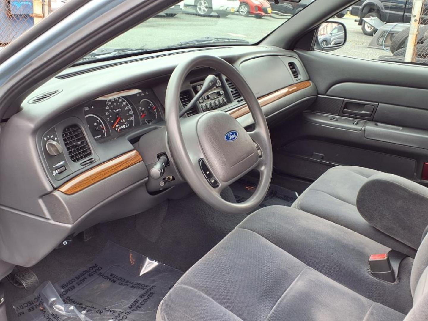 2003 Light Ice Blue Clearcoat Metallic Ford Crown Victoria Base (2FAFP73W03X) with an 4.6L 8 Cylinder Fuel Injected engine, V8 transmission, located at 50 Eastern Blvd., Essex, MD, 21221, (410) 686-3444, 39.304367, -76.484947 - Photo#9
