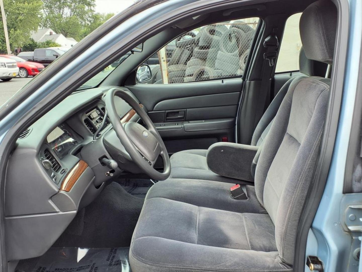 2003 Light Ice Blue Clearcoat Metallic Ford Crown Victoria Base (2FAFP73W03X) with an 4.6L 8 Cylinder Fuel Injected engine, V8 transmission, located at 50 Eastern Blvd., Essex, MD, 21221, (410) 686-3444, 39.304367, -76.484947 - Photo#10