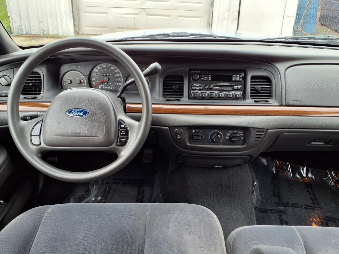 2003 Light Ice Blue Clearcoat Metallic Ford Crown Victoria Base (2FAFP73W03X) with an 4.6L 8 Cylinder Fuel Injected engine, V8 transmission, located at 50 Eastern Blvd., Essex, MD, 21221, (410) 686-3444, 39.304367, -76.484947 - Photo#13