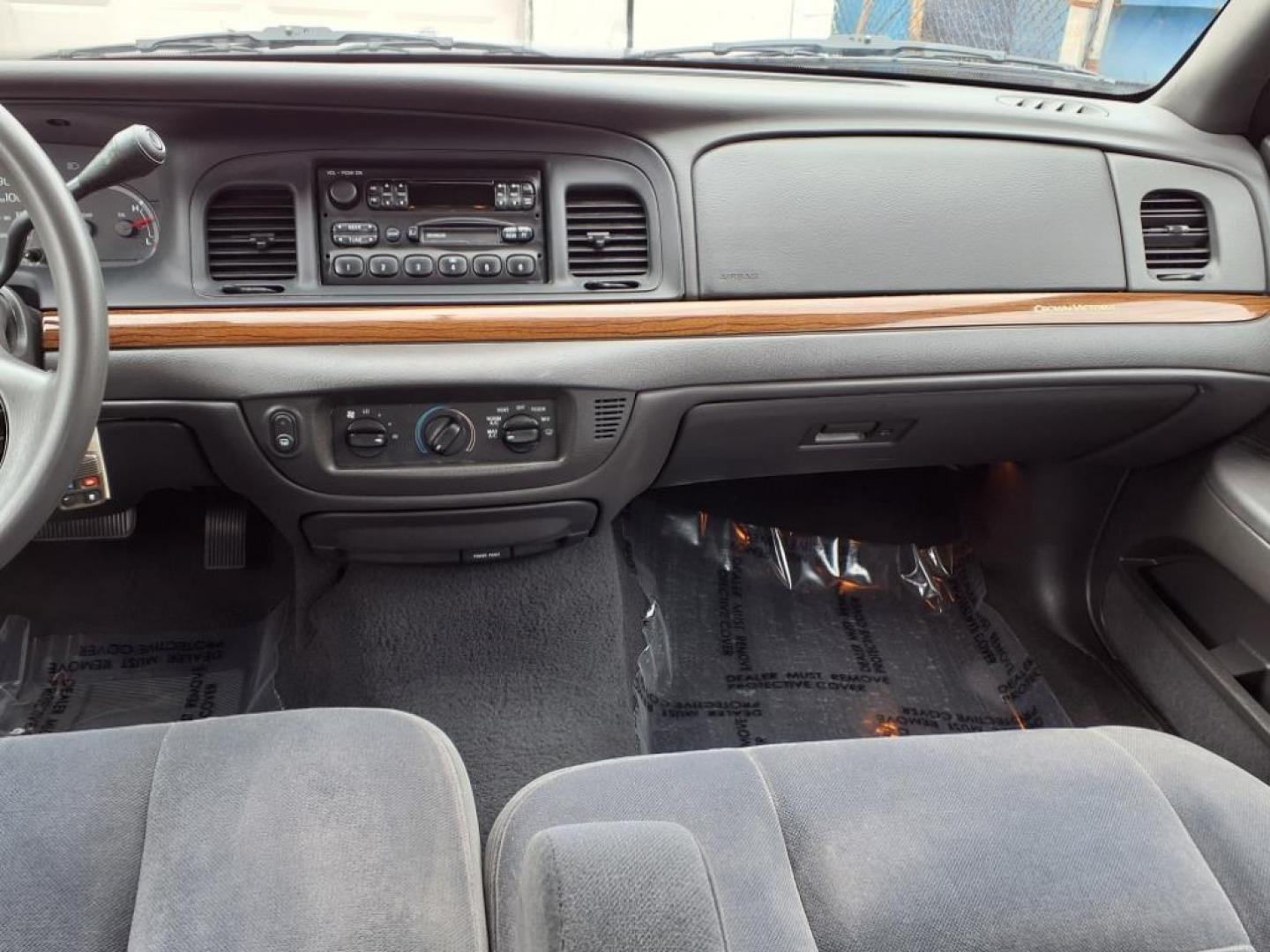 2003 Light Ice Blue Clearcoat Metallic Ford Crown Victoria Base (2FAFP73W03X) with an 4.6L 8 Cylinder Fuel Injected engine, V8 transmission, located at 50 Eastern Blvd., Essex, MD, 21221, (410) 686-3444, 39.304367, -76.484947 - Photo#14