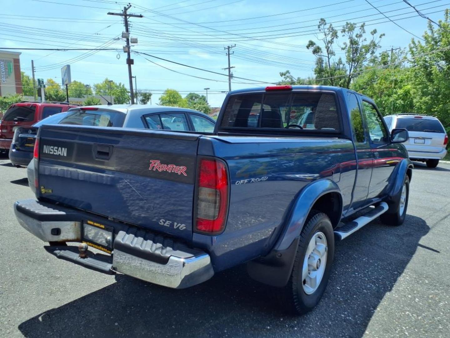 2000 Denim Blue Nissan Frontier SE (1N6ED26Y1YC) with an 3.3L 3L NA V6 single overhead cam (SOHC) 12V Fuel Injected engine, Automatic transmission, located at 50 Eastern Blvd., Essex, MD, 21221, (410) 686-3444, 39.304367, -76.484947 - Photo#2