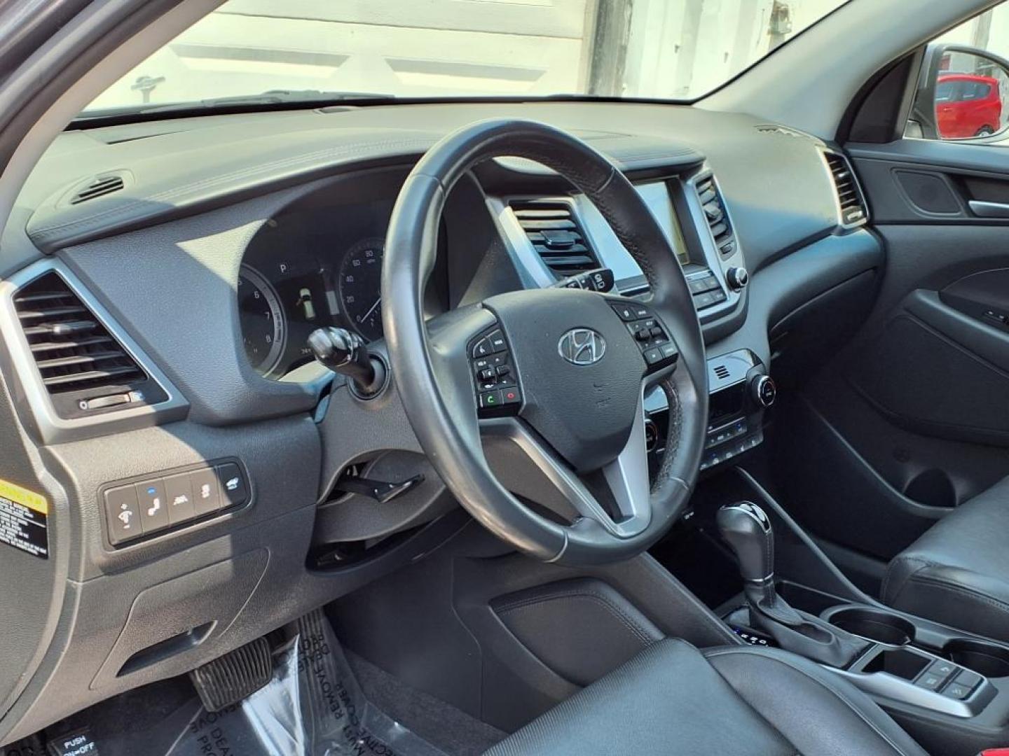 2016 Coliseum Gray Hyundai TUCSON Limited (KM8J33A22GU) with an 1.6L 4 Cylinder Turbocharged engine, AT AWD transmission, located at 50 Eastern Blvd., Essex, MD, 21221, (410) 686-3444, 39.304367, -76.484947 - Photo#11