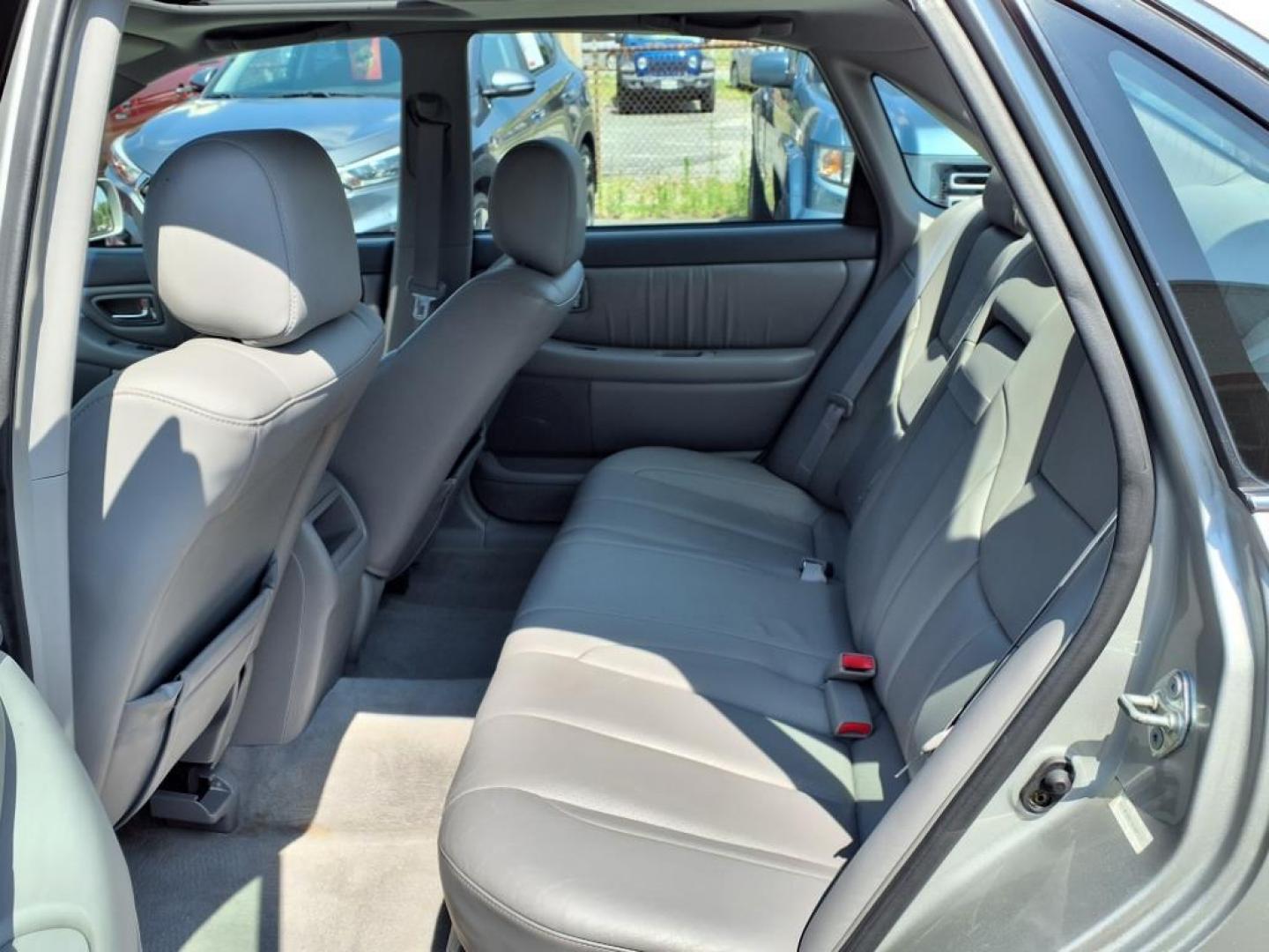 2003 Silver Spruce Metallic Toyota Avalon XL (4T1BF28B13U) with an 3.0L 3.0L V6 210hp 220ft. lbs. Fuel Injected engine, 4-Speed Automatic transmission, located at 50 Eastern Blvd., Essex, MD, 21221, (410) 686-3444, 39.304367, -76.484947 - Photo#12