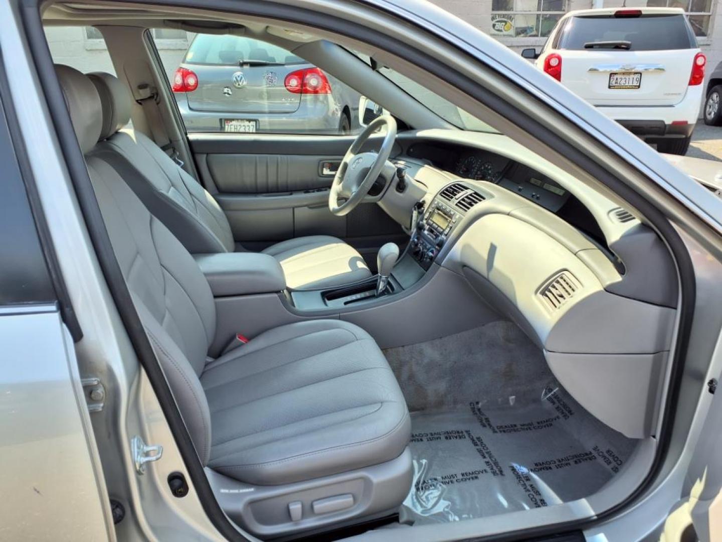 2003 Silver Spruce Metallic Toyota Avalon XL (4T1BF28B13U) with an 3.0L 3.0L V6 210hp 220ft. lbs. Fuel Injected engine, 4-Speed Automatic transmission, located at 50 Eastern Blvd., Essex, MD, 21221, (410) 686-3444, 39.304367, -76.484947 - Photo#16