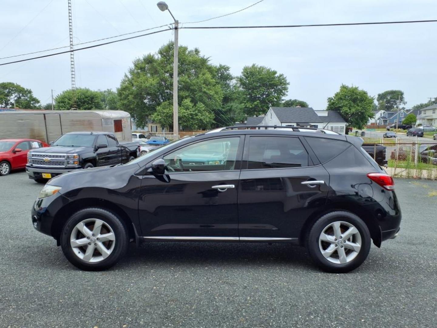 2009 Super Black Nissan Murano SL (JN8AZ18W29W) with an 3.5L 3.5L V6 265hp 248ft. lbs. Fuel Injected engine, CVT transmission, located at 50 Eastern Blvd., Essex, MD, 21221, (410) 686-3444, 39.304367, -76.484947 - Photo#1