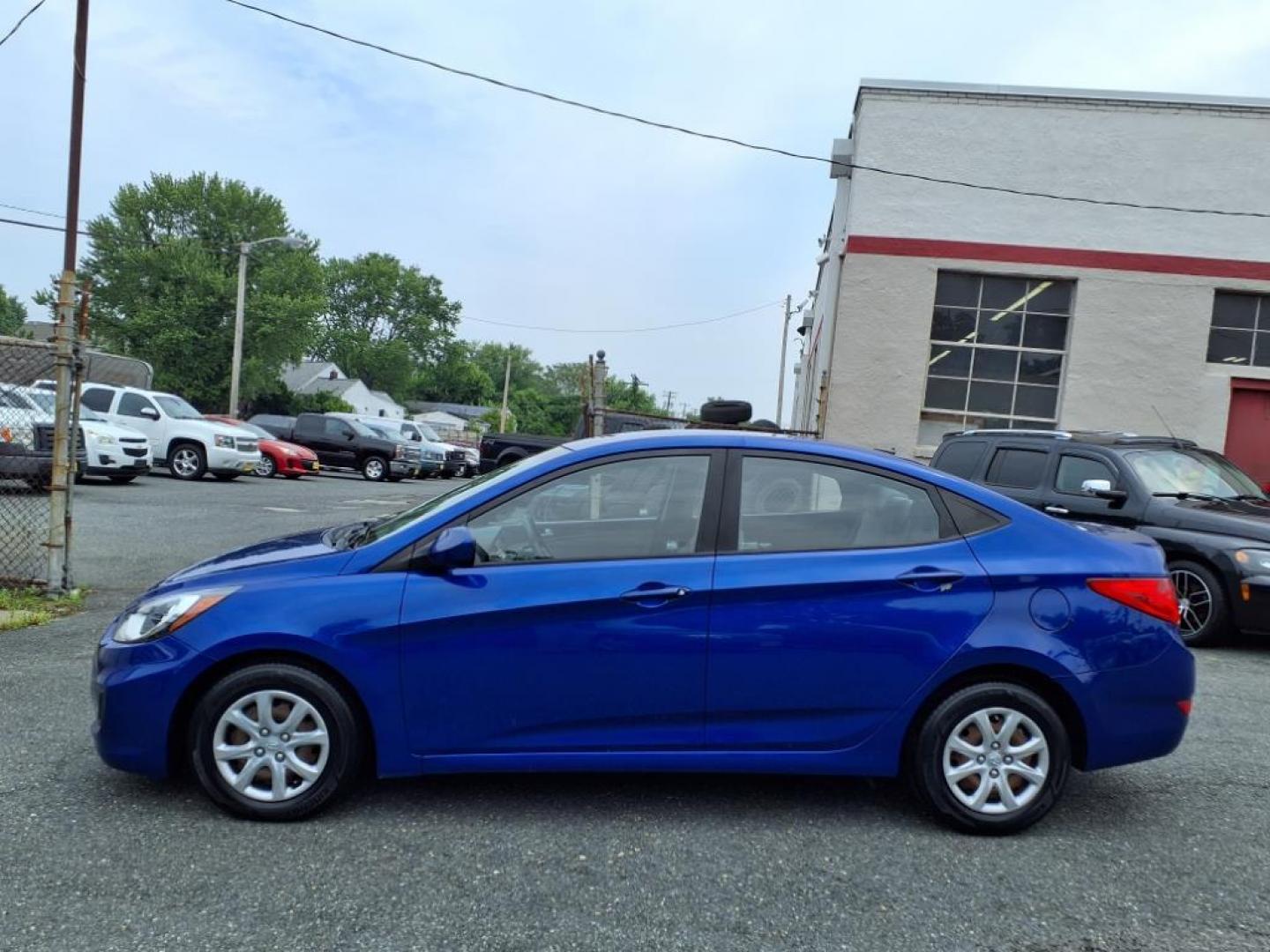 2013 Marathon Blue Hyundai ACCENT GLS (KMHCT4AE7DU) with an 1.6L 4 Cylinder Fuel Injected engine, Automatic transmission, located at 50 Eastern Blvd., Essex, MD, 21221, (410) 686-3444, 39.304367, -76.484947 - Photo#1