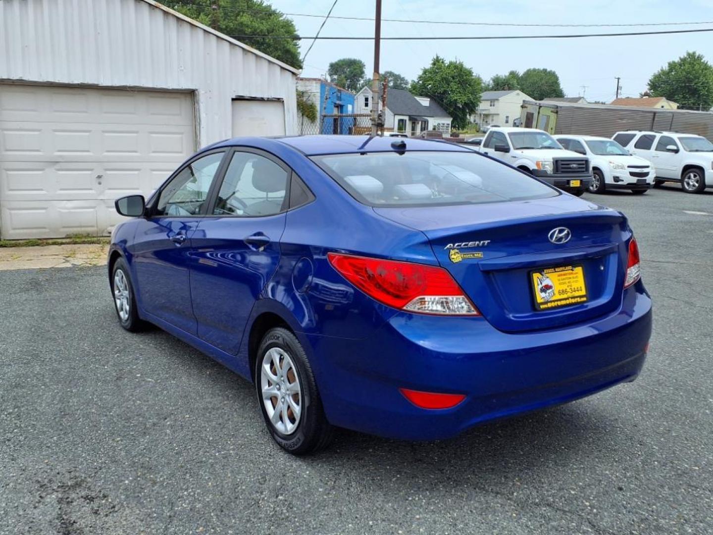 2013 Marathon Blue Hyundai ACCENT GLS (KMHCT4AE7DU) with an 1.6L 4 Cylinder Fuel Injected engine, Automatic transmission, located at 50 Eastern Blvd., Essex, MD, 21221, (410) 686-3444, 39.304367, -76.484947 - Photo#2