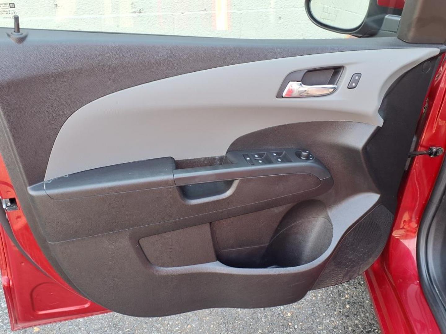 2015 Red Hot Chevrolet Sonic LT Auto (1G1JC5SG6F4) with an 1.8L 4 Cylinder Sequential-Port F.I. engine, AT 4CYL transmission, located at 50 Eastern Blvd., Essex, MD, 21221, (410) 686-3444, 39.304367, -76.484947 - Photo#8