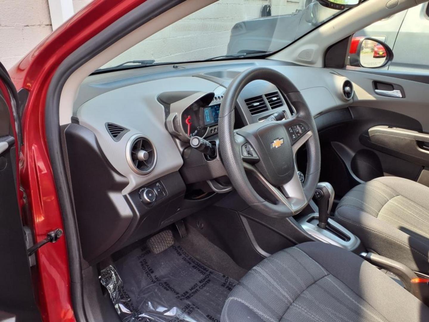 2015 Red Hot Chevrolet Sonic LT Auto (1G1JC5SG6F4) with an 1.8L 4 Cylinder Sequential-Port F.I. engine, AT 4CYL transmission, located at 50 Eastern Blvd., Essex, MD, 21221, (410) 686-3444, 39.304367, -76.484947 - Photo#9