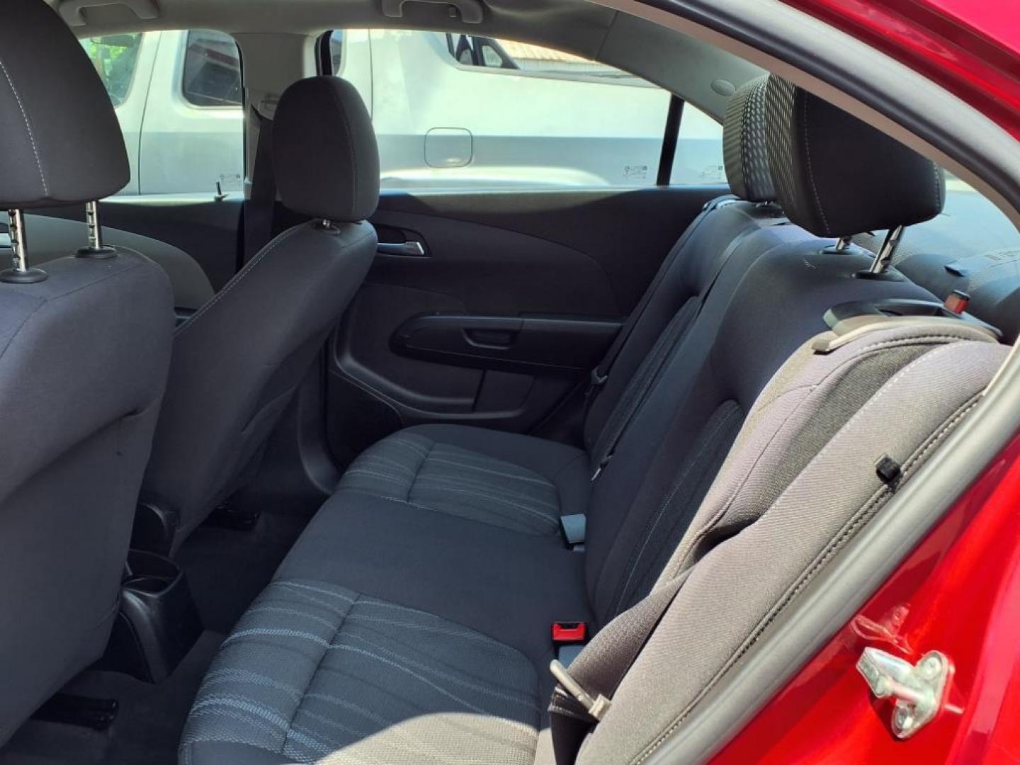 2015 Red Hot Chevrolet Sonic LT Auto (1G1JC5SG6F4) with an 1.8L 4 Cylinder Sequential-Port F.I. engine, AT 4CYL transmission, located at 50 Eastern Blvd., Essex, MD, 21221, (410) 686-3444, 39.304367, -76.484947 - Photo#11