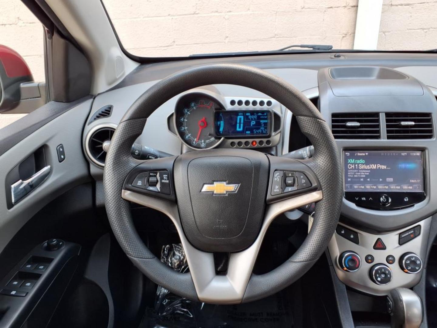 2015 Red Hot Chevrolet Sonic LT Auto (1G1JC5SG6F4) with an 1.8L 4 Cylinder Sequential-Port F.I. engine, AT 4CYL transmission, located at 50 Eastern Blvd., Essex, MD, 21221, (410) 686-3444, 39.304367, -76.484947 - Photo#12