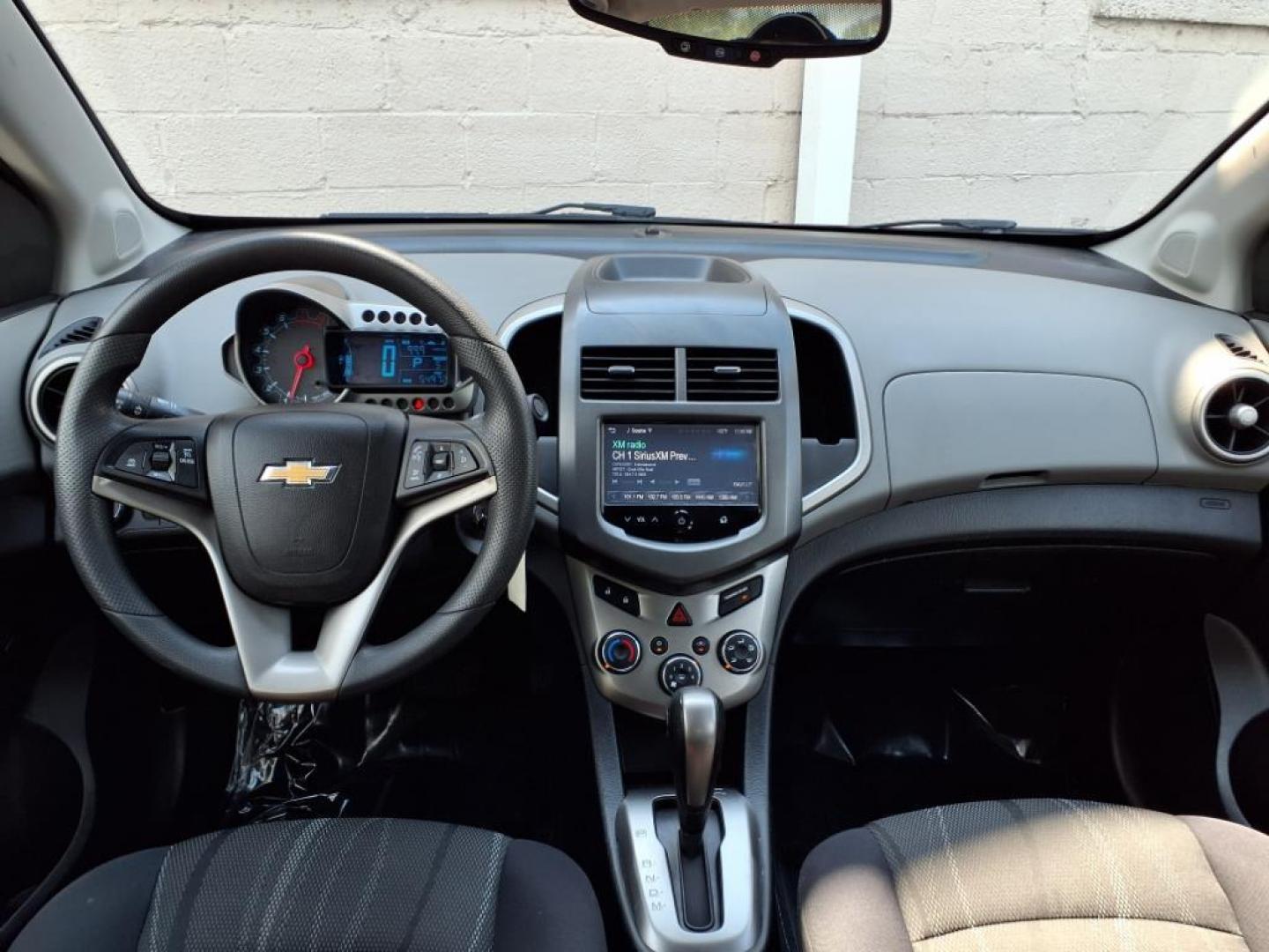 2015 Red Hot Chevrolet Sonic LT Auto (1G1JC5SG6F4) with an 1.8L 4 Cylinder Sequential-Port F.I. engine, AT 4CYL transmission, located at 50 Eastern Blvd., Essex, MD, 21221, (410) 686-3444, 39.304367, -76.484947 - Photo#13