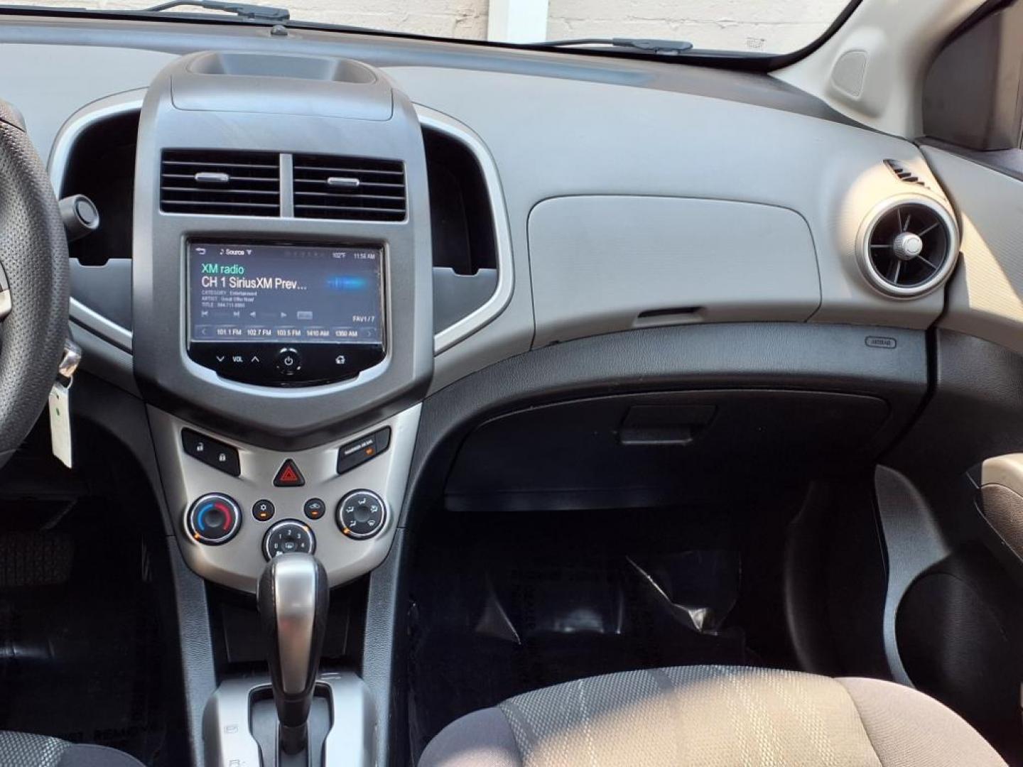 2015 Red Hot Chevrolet Sonic LT Auto (1G1JC5SG6F4) with an 1.8L 4 Cylinder Sequential-Port F.I. engine, AT 4CYL transmission, located at 50 Eastern Blvd., Essex, MD, 21221, (410) 686-3444, 39.304367, -76.484947 - Photo#14