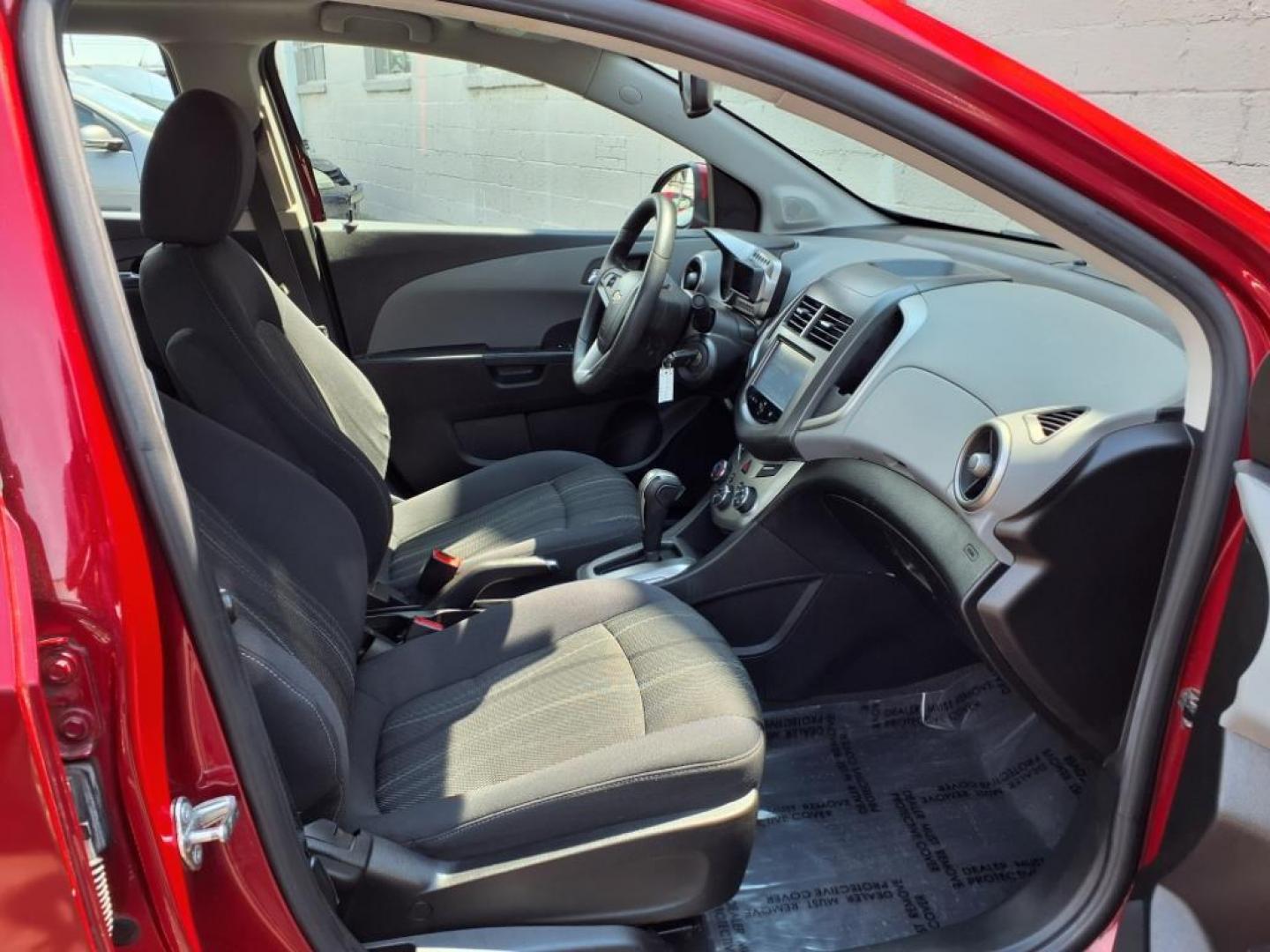 2015 Red Hot Chevrolet Sonic LT Auto (1G1JC5SG6F4) with an 1.8L 4 Cylinder Sequential-Port F.I. engine, AT 4CYL transmission, located at 50 Eastern Blvd., Essex, MD, 21221, (410) 686-3444, 39.304367, -76.484947 - Photo#15