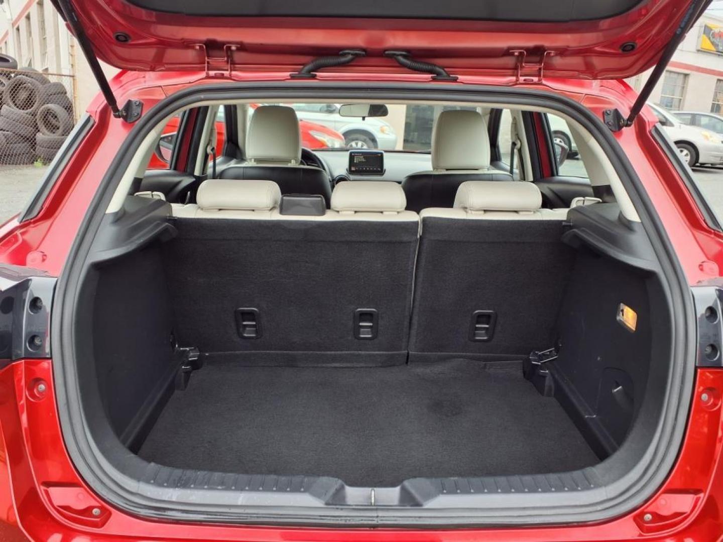 2016 Red Mazda CX-3 Grand Touring (JM1DKBD78G0) with an 2.0L 4 Cylinder Fuel Injected engine, ATAWD transmission, located at 50 Eastern Blvd., Essex, MD, 21221, (410) 686-3444, 39.304367, -76.484947 - Photo#4