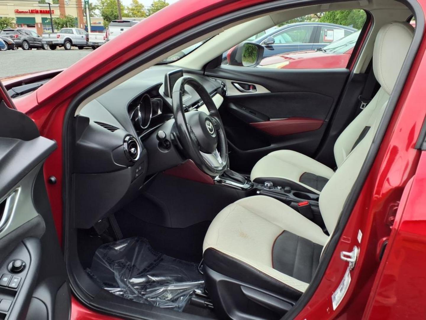 2016 Red Mazda CX-3 Grand Touring (JM1DKBD78G0) with an 2.0L 4 Cylinder Fuel Injected engine, ATAWD transmission, located at 50 Eastern Blvd., Essex, MD, 21221, (410) 686-3444, 39.304367, -76.484947 - Photo#12