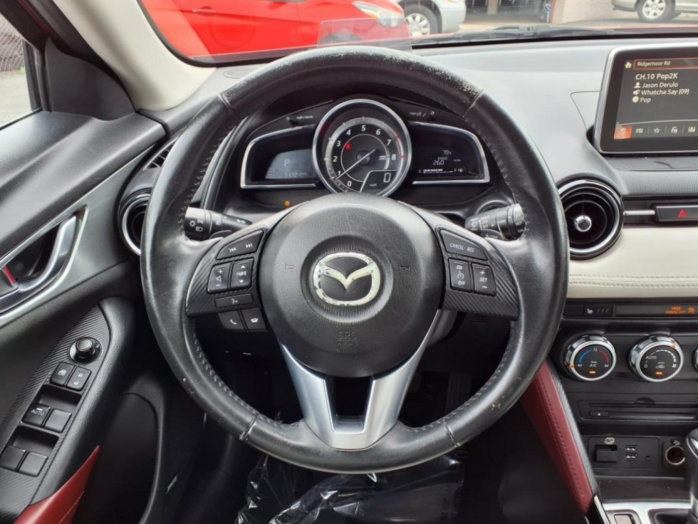 2016 Red Mazda CX-3 Grand Touring (JM1DKBD78G0) with an 2.0L 4 Cylinder Fuel Injected engine, ATAWD transmission, located at 50 Eastern Blvd., Essex, MD, 21221, (410) 686-3444, 39.304367, -76.484947 - Photo#14