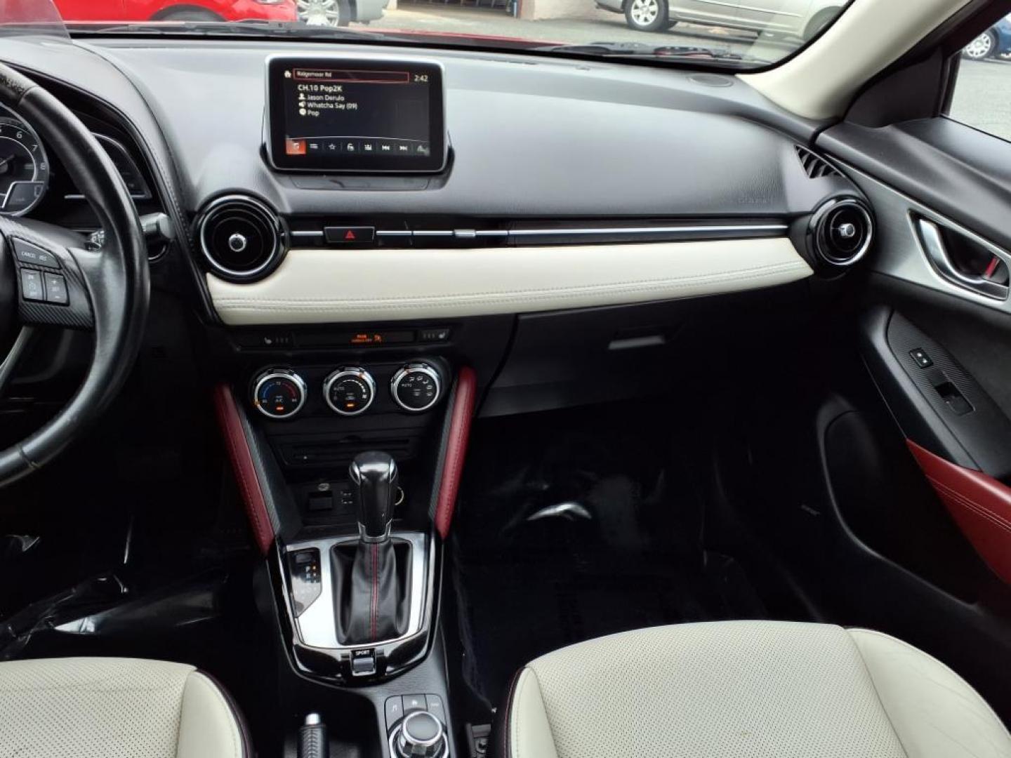 2016 Red Mazda CX-3 Grand Touring (JM1DKBD78G0) with an 2.0L 4 Cylinder Fuel Injected engine, ATAWD transmission, located at 50 Eastern Blvd., Essex, MD, 21221, (410) 686-3444, 39.304367, -76.484947 - Photo#16