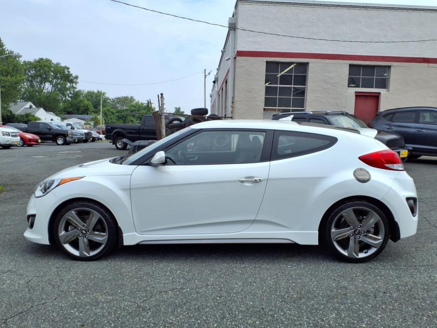 2015 White Hyundai VELOSTER Turbo (KMHTC6AE9FU) with an 1.6L 4 Cylinder Turbocharged engine, 6SP transmission, located at 50 Eastern Blvd., Essex, MD, 21221, (410) 686-3444, 39.304367, -76.484947 - Photo#1