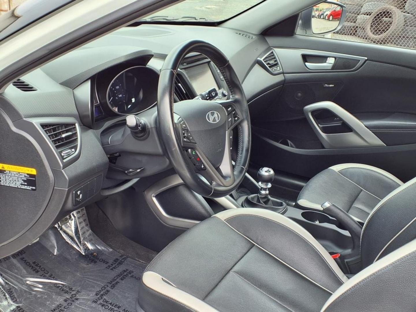 2015 White Hyundai VELOSTER Turbo (KMHTC6AE9FU) with an 1.6L 4 Cylinder Turbocharged engine, 6SP transmission, located at 50 Eastern Blvd., Essex, MD, 21221, (410) 686-3444, 39.304367, -76.484947 - Photo#9