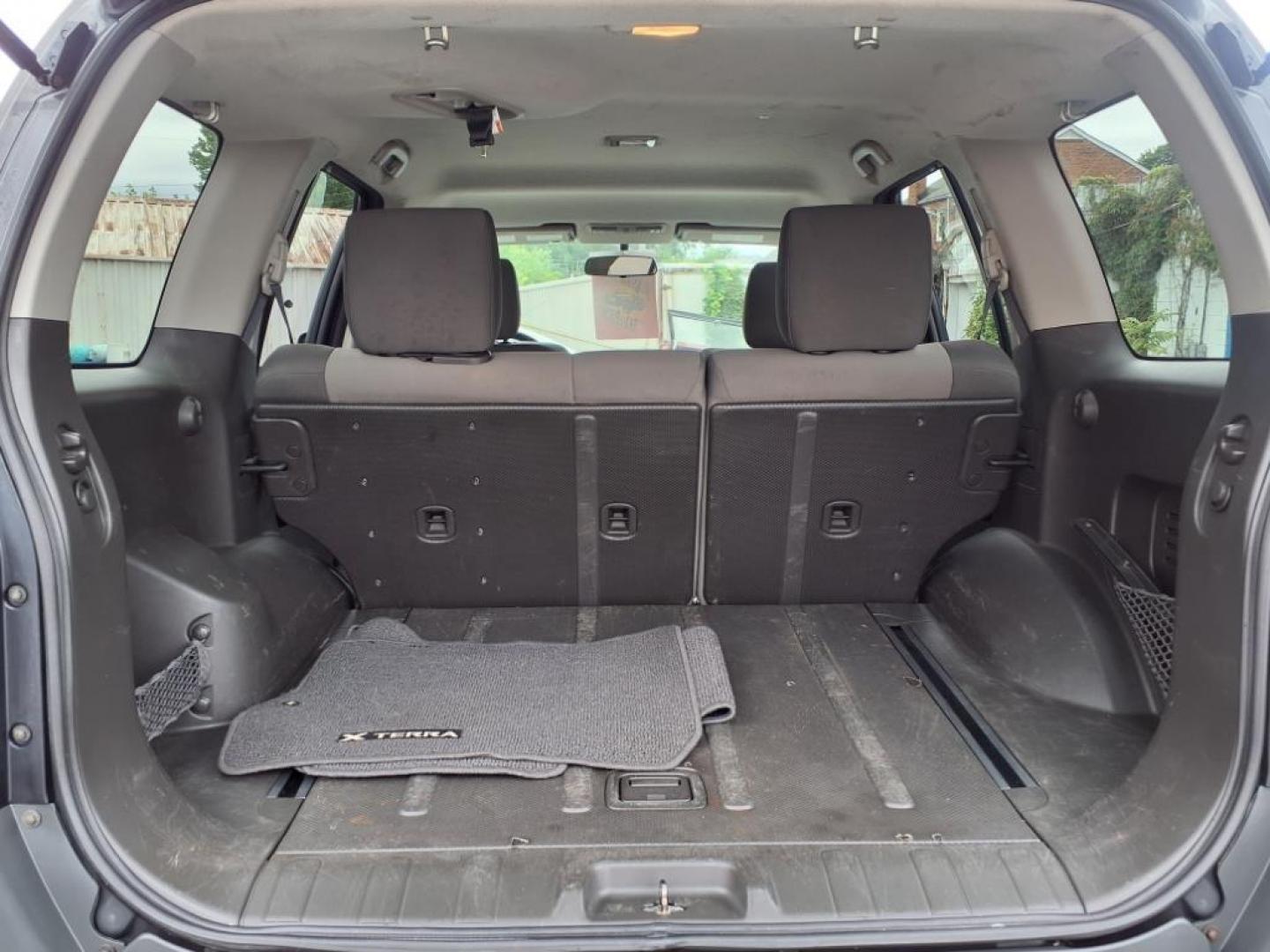 2012 Night Armor Nissan Xterra X (5N1AN0NW5CC) with an 4.0L 4.0L V6 261hp 281ft. lbs. Fuel Injected engine, 5-Speed Automatic transmission, located at 50 Eastern Blvd., Essex, MD, 21221, (410) 686-3444, 39.304367, -76.484947 - Photo#3