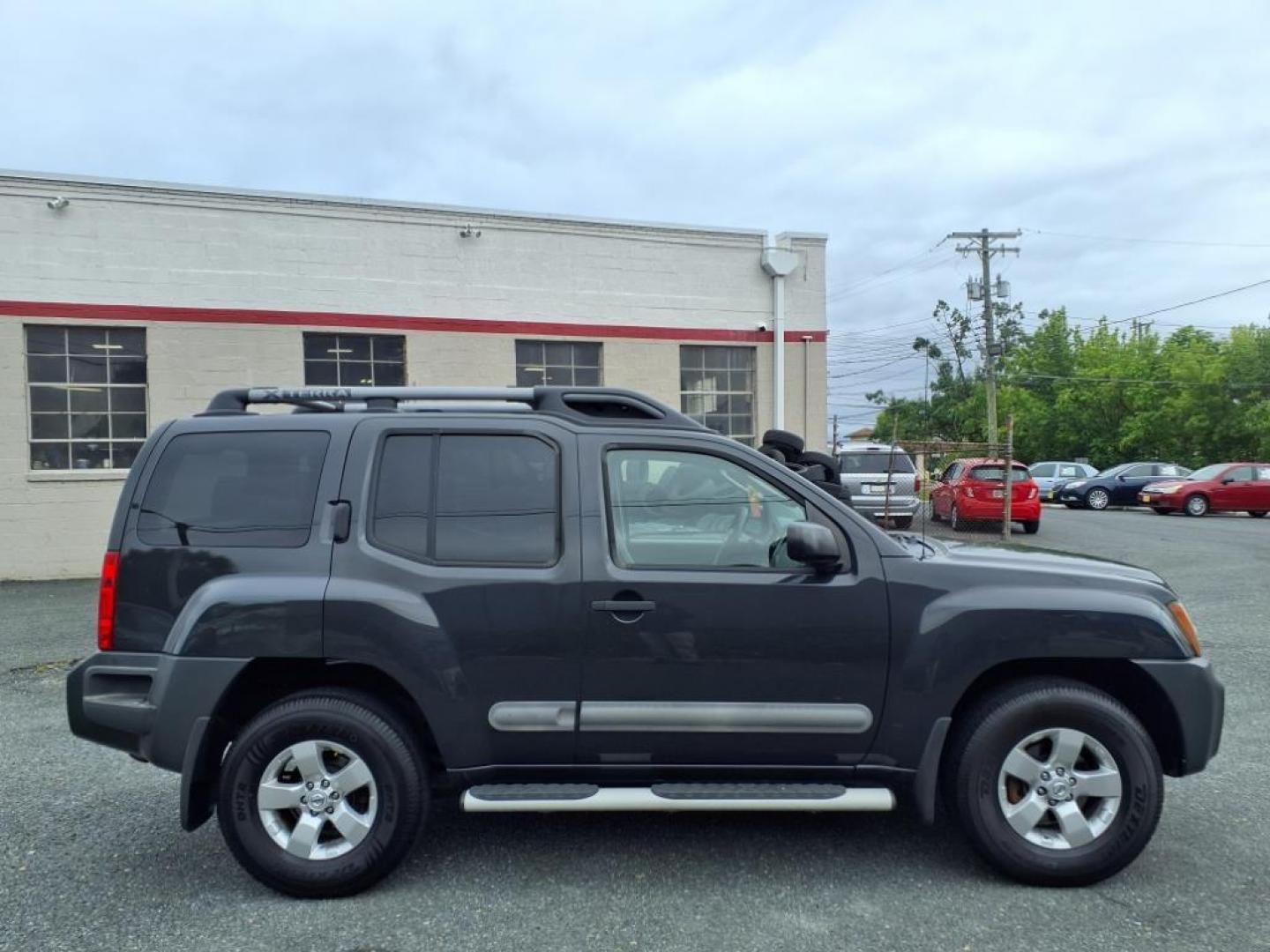 2012 Night Armor Nissan Xterra X (5N1AN0NW5CC) with an 4.0L 4.0L V6 261hp 281ft. lbs. Fuel Injected engine, 5-Speed Automatic transmission, located at 50 Eastern Blvd., Essex, MD, 21221, (410) 686-3444, 39.304367, -76.484947 - Photo#5