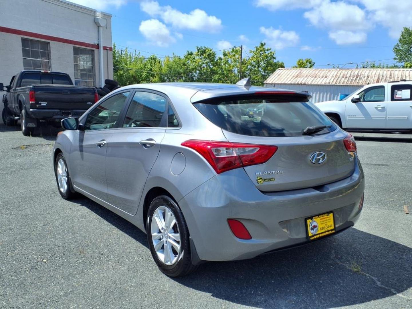 2013 Silver Hyundai ELANTRA GT Base (KMHD35LE7DU) with an 1.8L 4 Cylinder Sequential Fuel Injection engine, 4CYL transmission, located at 50 Eastern Blvd., Essex, MD, 21221, (410) 686-3444, 39.304367, -76.484947 - Photo#2