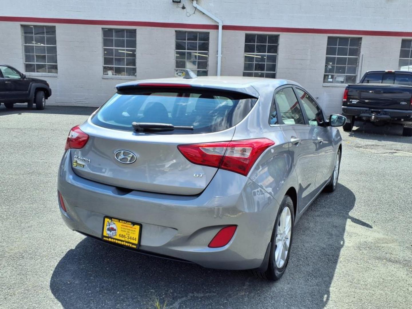 2013 Silver Hyundai ELANTRA GT Base (KMHD35LE7DU) with an 1.8L 4 Cylinder Sequential Fuel Injection engine, 4CYL transmission, located at 50 Eastern Blvd., Essex, MD, 21221, (410) 686-3444, 39.304367, -76.484947 - Photo#4