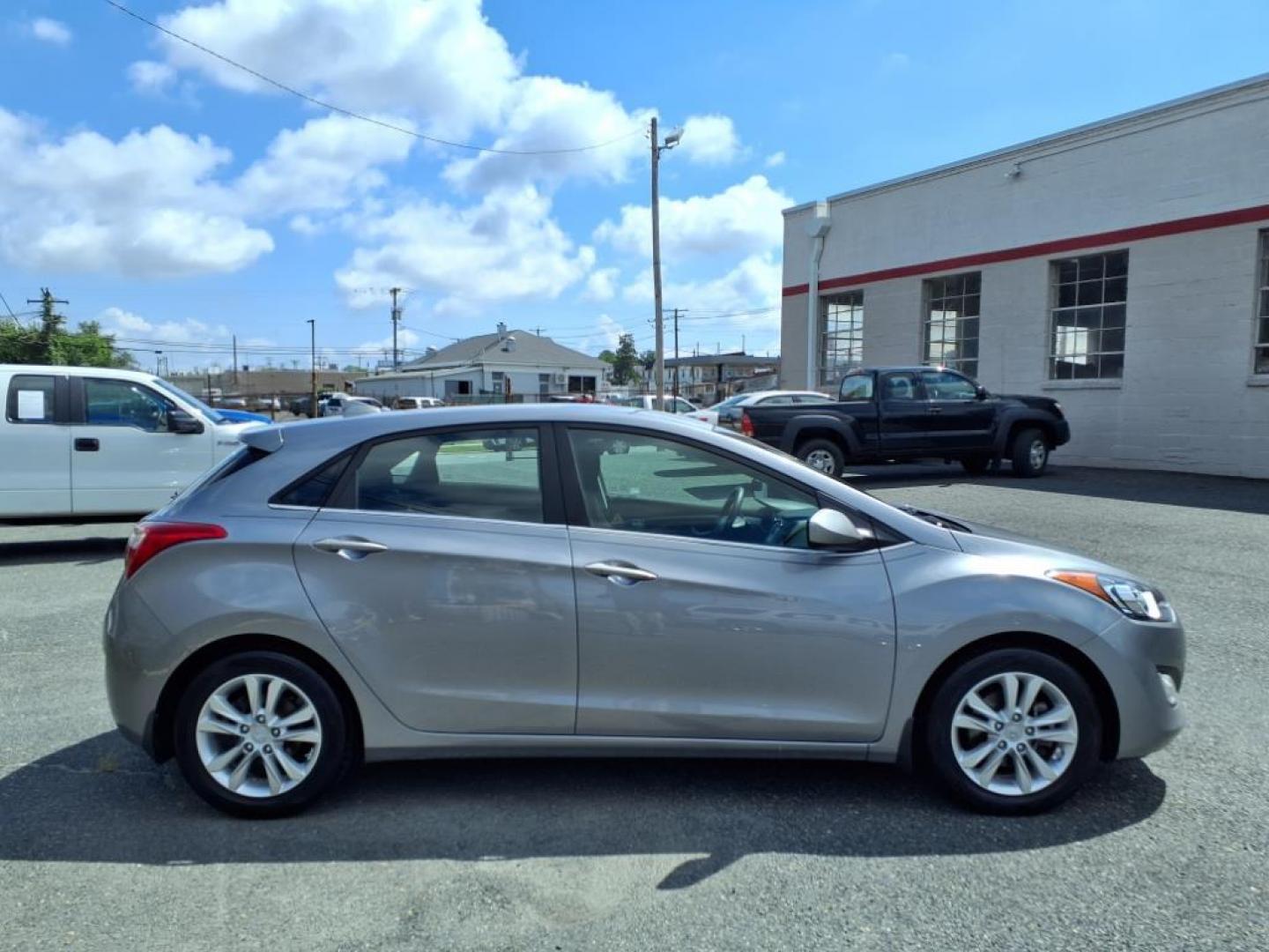 2013 Silver Hyundai ELANTRA GT Base (KMHD35LE7DU) with an 1.8L 4 Cylinder Sequential Fuel Injection engine, 4CYL transmission, located at 50 Eastern Blvd., Essex, MD, 21221, (410) 686-3444, 39.304367, -76.484947 - Photo#5
