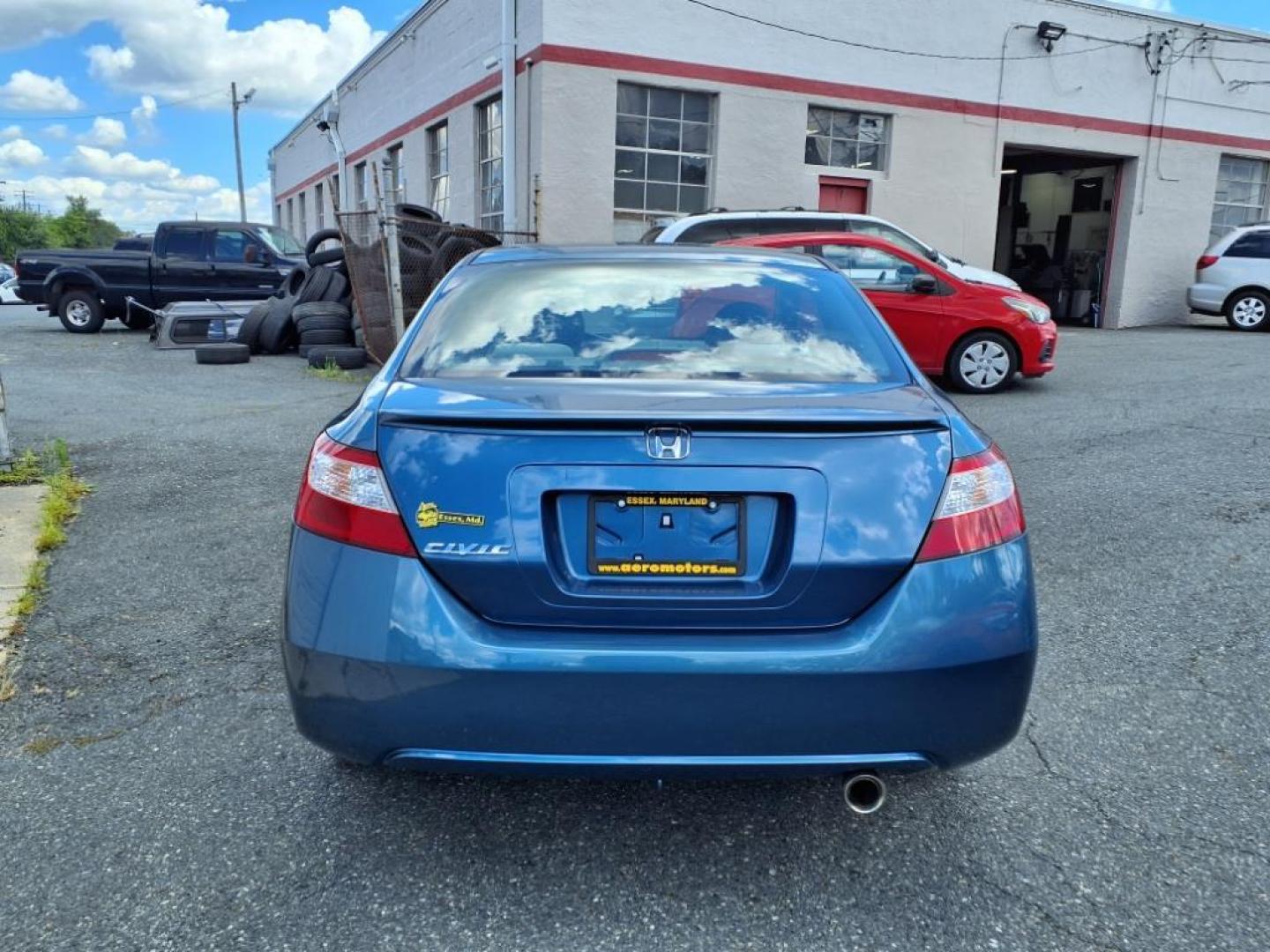 2006 Atomic Blue Metallic Honda Civic EX (2HGFG12876H) with an 1.8L 1L NA I4 single overhead cam (SOHC) 16V Fuel Injected engine, 5-Speed Automatic transmission, located at 50 Eastern Blvd., Essex, MD, 21221, (410) 686-3444, 39.304367, -76.484947 - Photo#3