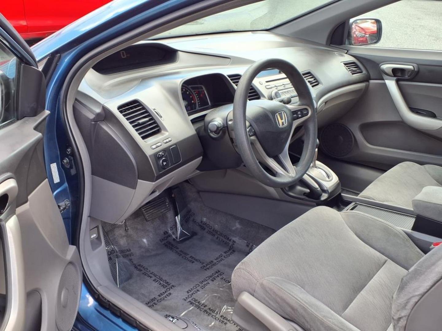 2006 Atomic Blue Metallic Honda Civic EX (2HGFG12876H) with an 1.8L 1L NA I4 single overhead cam (SOHC) 16V Fuel Injected engine, 5-Speed Automatic transmission, located at 50 Eastern Blvd., Essex, MD, 21221, (410) 686-3444, 39.304367, -76.484947 - Photo#10