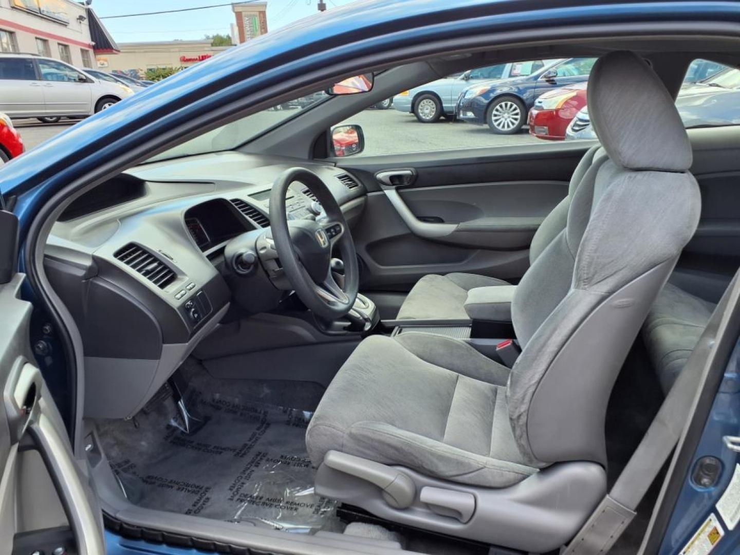2006 Atomic Blue Metallic Honda Civic EX (2HGFG12876H) with an 1.8L 1L NA I4 single overhead cam (SOHC) 16V Fuel Injected engine, 5-Speed Automatic transmission, located at 50 Eastern Blvd., Essex, MD, 21221, (410) 686-3444, 39.304367, -76.484947 - Photo#11