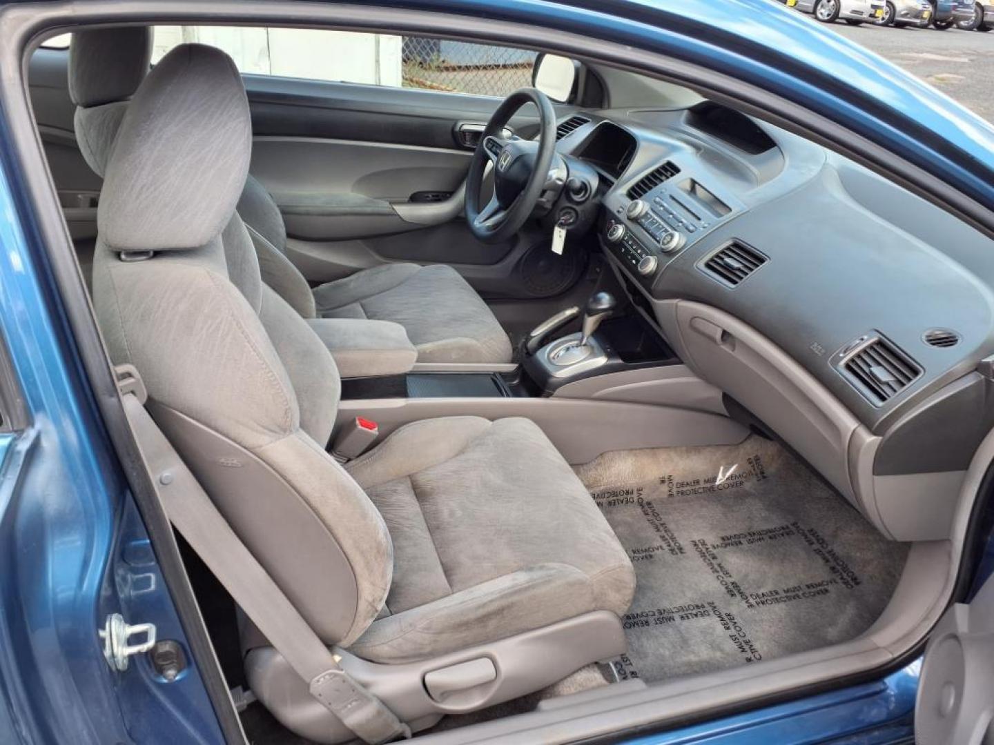2006 Atomic Blue Metallic Honda Civic EX (2HGFG12876H) with an 1.8L 1L NA I4 single overhead cam (SOHC) 16V Fuel Injected engine, 5-Speed Automatic transmission, located at 50 Eastern Blvd., Essex, MD, 21221, (410) 686-3444, 39.304367, -76.484947 - Photo#14