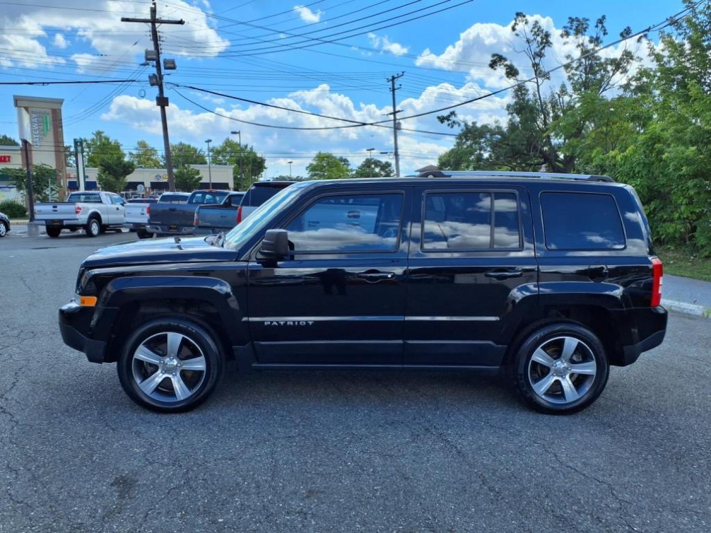 2016 Black Clear Coat Jeep Patriot High Altitude (1C4NJRFB3GD) with an 2.4L 4 Cylinder Sequential-Port F.I. engine, AWD transmission, located at 50 Eastern Blvd., Essex, MD, 21221, (410) 686-3444, 39.304367, -76.484947 - Photo#1