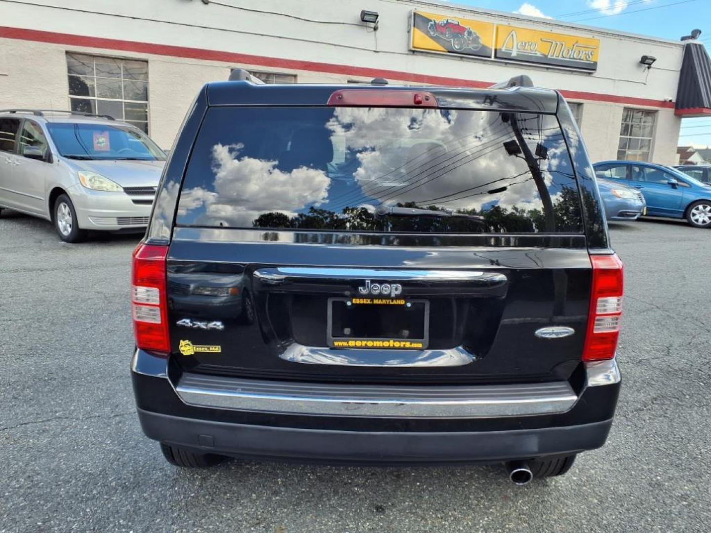 2016 Black Clear Coat Jeep Patriot High Altitude (1C4NJRFB3GD) with an 2.4L 4 Cylinder Sequential-Port F.I. engine, AWD transmission, located at 50 Eastern Blvd., Essex, MD, 21221, (410) 686-3444, 39.304367, -76.484947 - Photo#3
