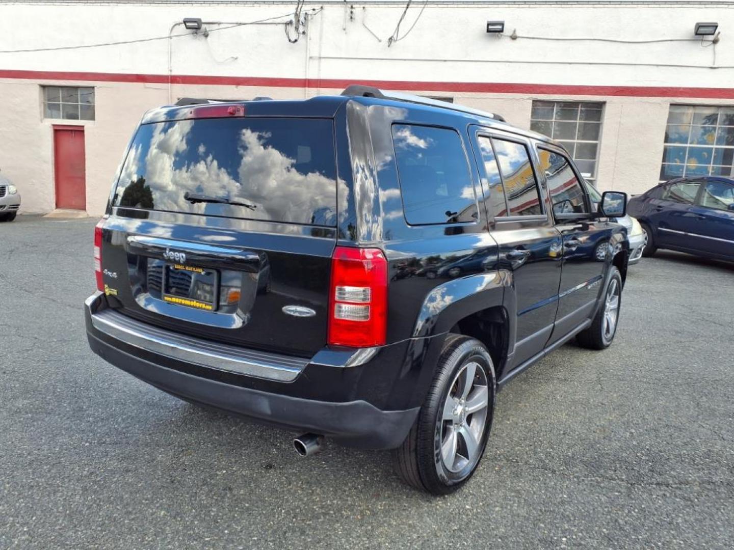 2016 Black Clear Coat Jeep Patriot High Altitude (1C4NJRFB3GD) with an 2.4L 4 Cylinder Sequential-Port F.I. engine, AWD transmission, located at 50 Eastern Blvd., Essex, MD, 21221, (410) 686-3444, 39.304367, -76.484947 - Photo#4