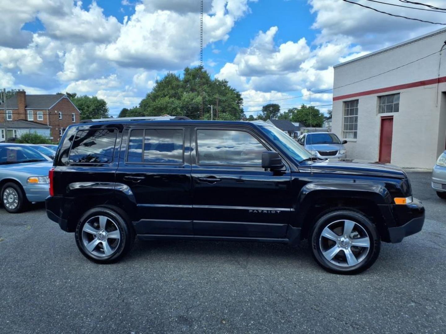2016 Black Clear Coat Jeep Patriot High Altitude (1C4NJRFB3GD) with an 2.4L 4 Cylinder Sequential-Port F.I. engine, AWD transmission, located at 50 Eastern Blvd., Essex, MD, 21221, (410) 686-3444, 39.304367, -76.484947 - Photo#5