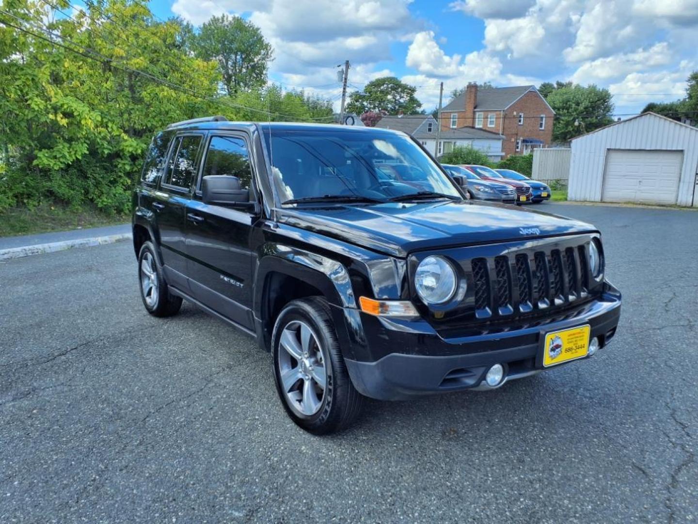 2016 Black Clear Coat Jeep Patriot High Altitude (1C4NJRFB3GD) with an 2.4L 4 Cylinder Sequential-Port F.I. engine, AWD transmission, located at 50 Eastern Blvd., Essex, MD, 21221, (410) 686-3444, 39.304367, -76.484947 - Photo#6